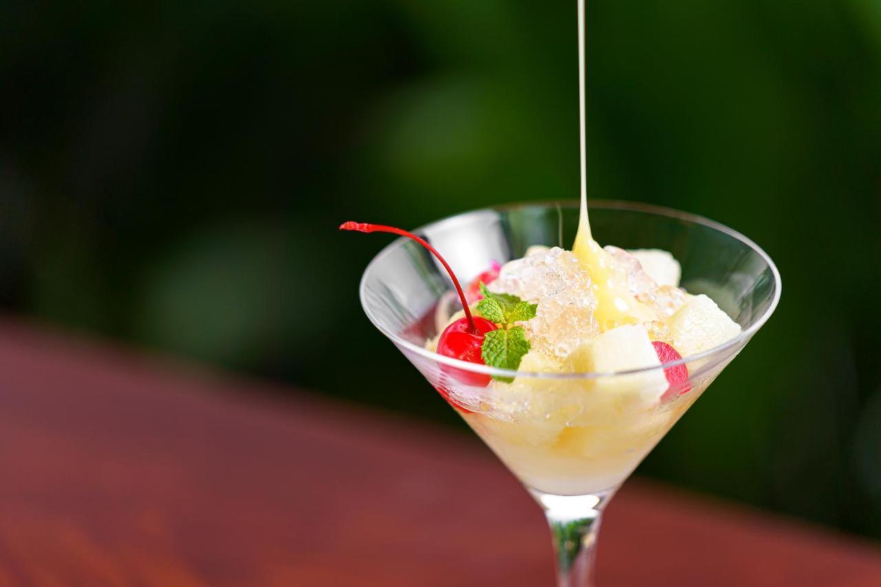 Shintana Saya La Maison Сием Реап Екстериор снимка A dessert being drizzled with crème anglaise